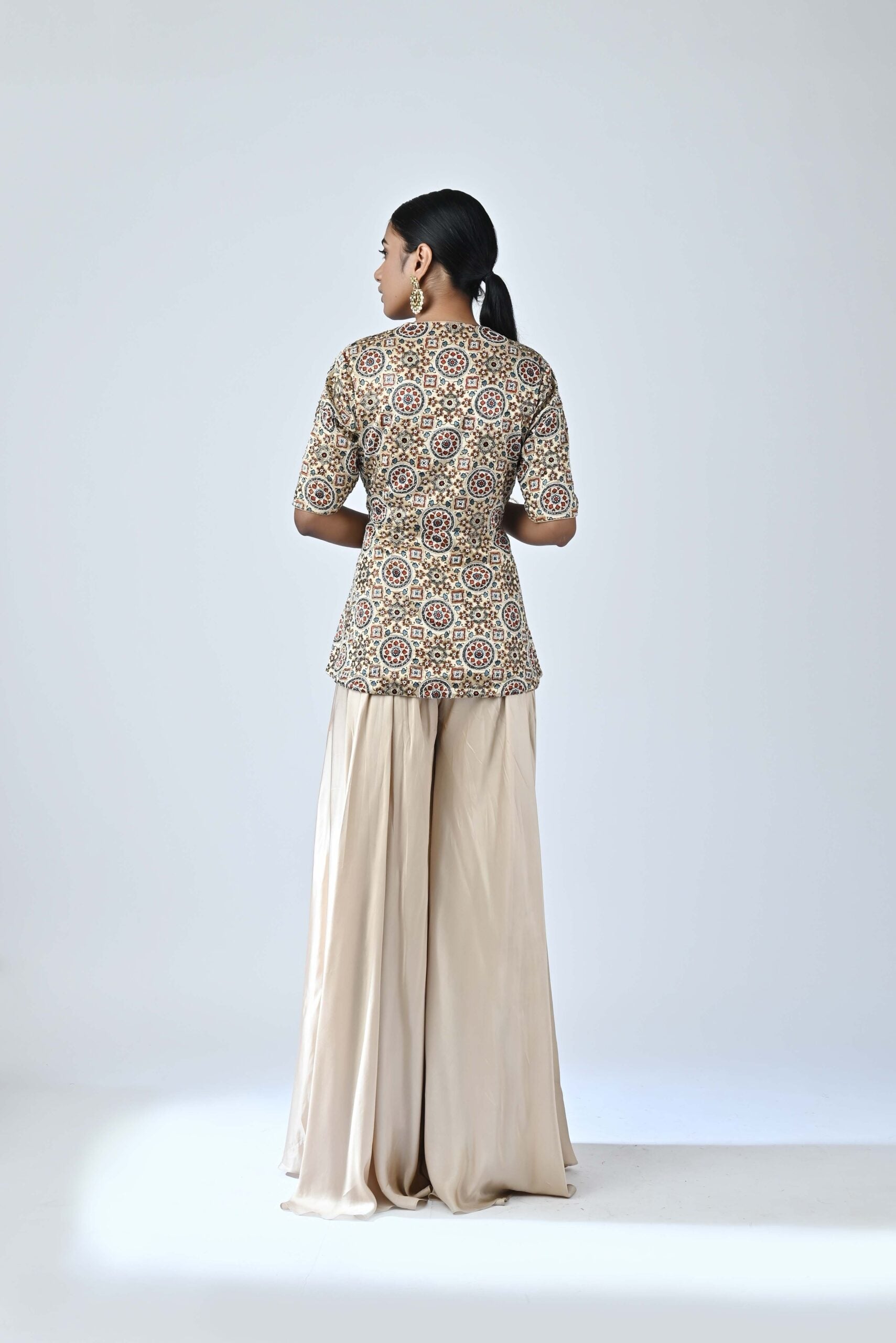 Ajrakh embroidered peplum top with flare pants