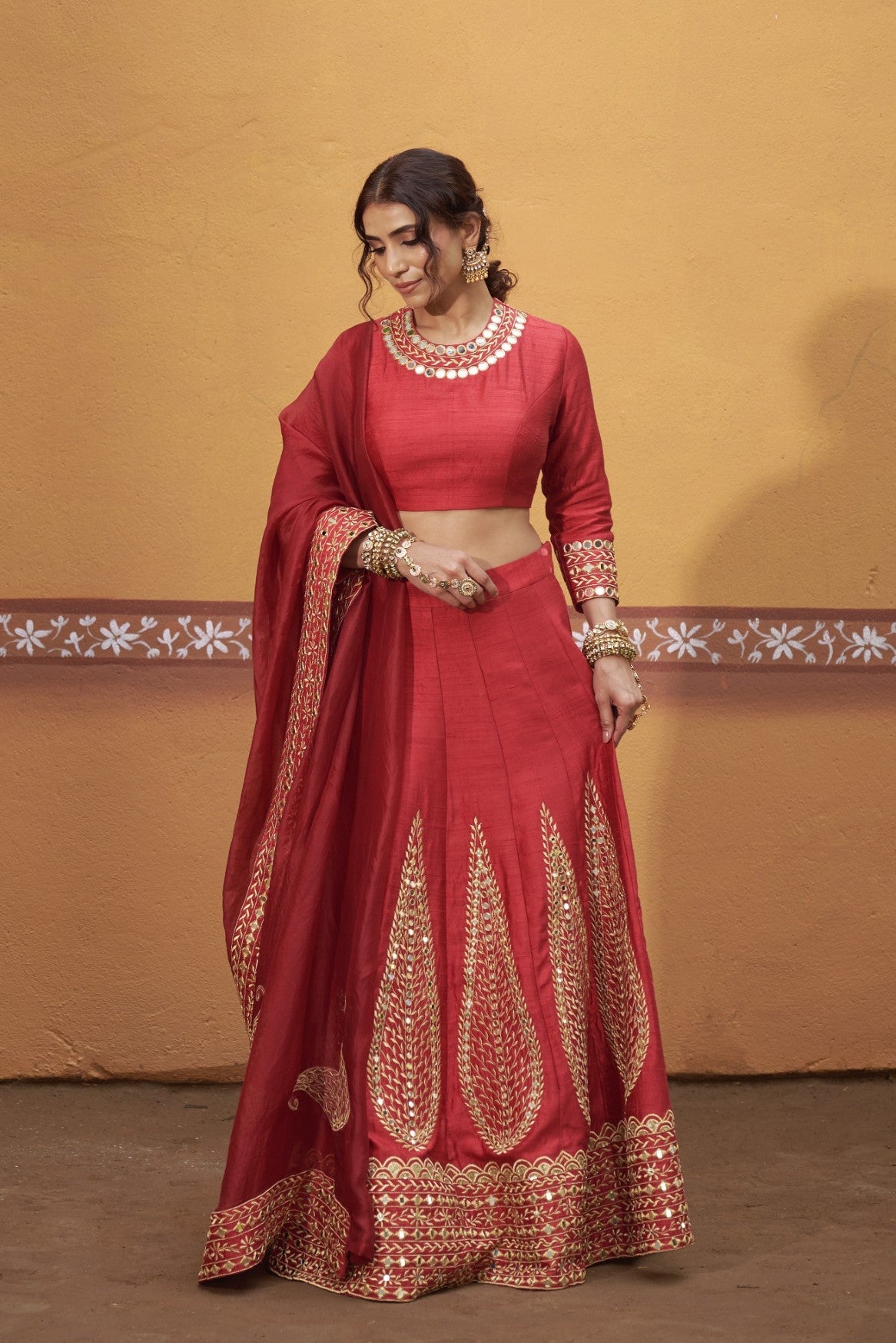 Kalidar red hand embroidered lehenga with blouse and dupatta