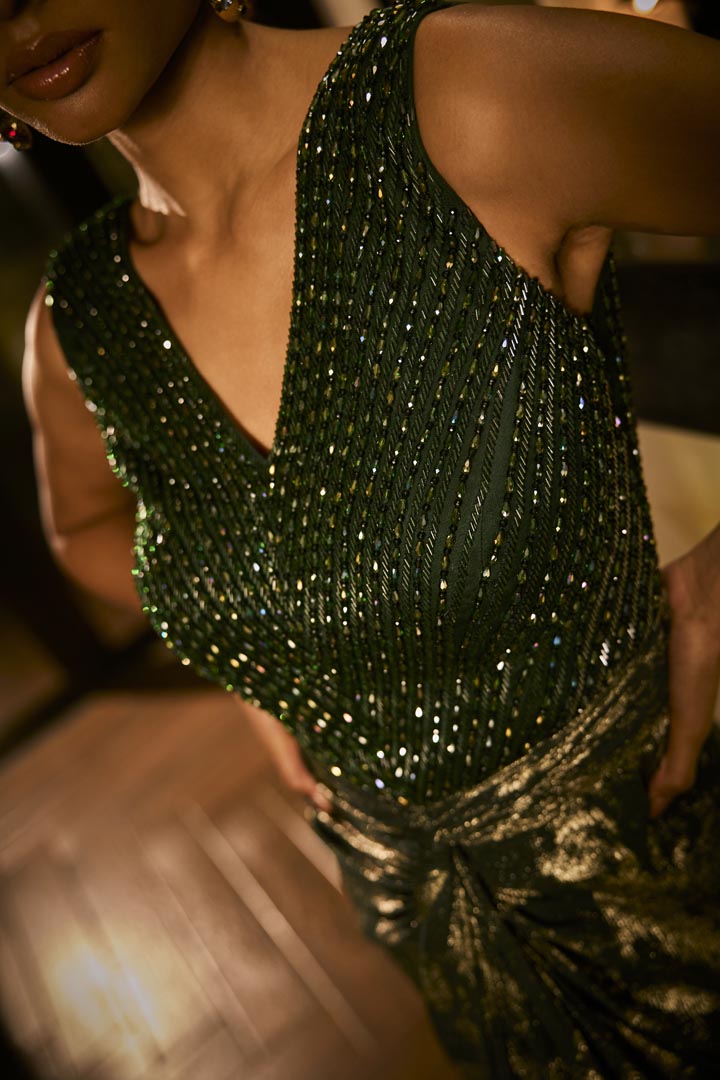 Emerald green embellished gown.