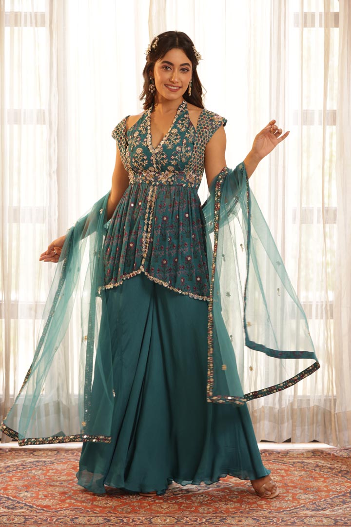 Image of Double neck hand embroidered peplum, Paired with Flared pant and net dupatta