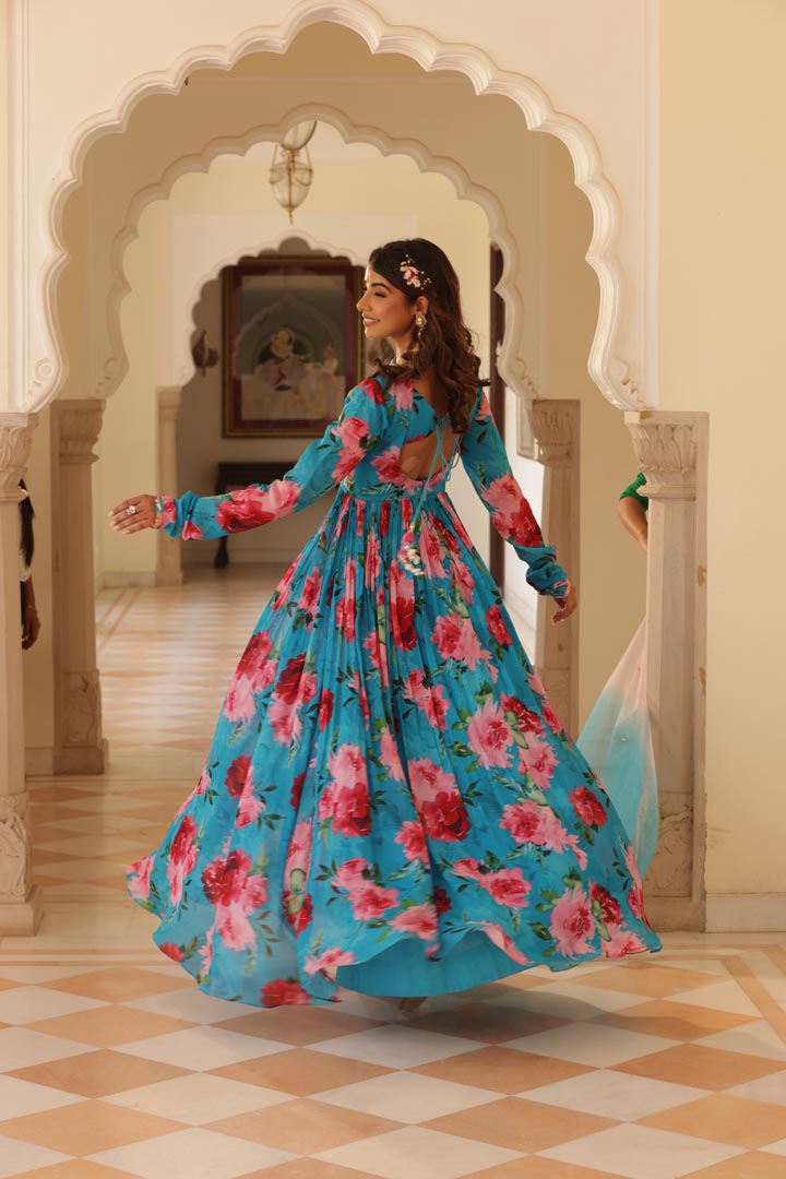 Image of Featuring Floral printed Anarkali with hand embroidered yoke and churidaar sleeves. Paird with double shadede net embroidered dupatta