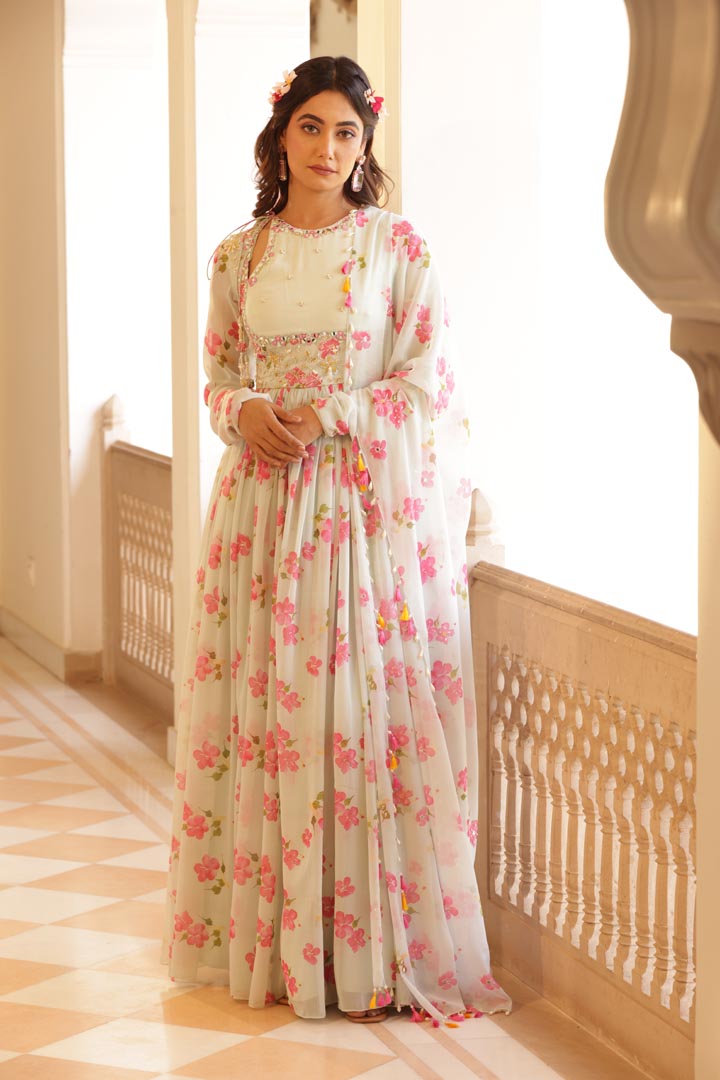 Image of Floral printed chiffon Anarkali with Embroidery and keyhole details on yoke. Paired with chiffon printed dupatta, beads and fringe latkan details all over the dupatta