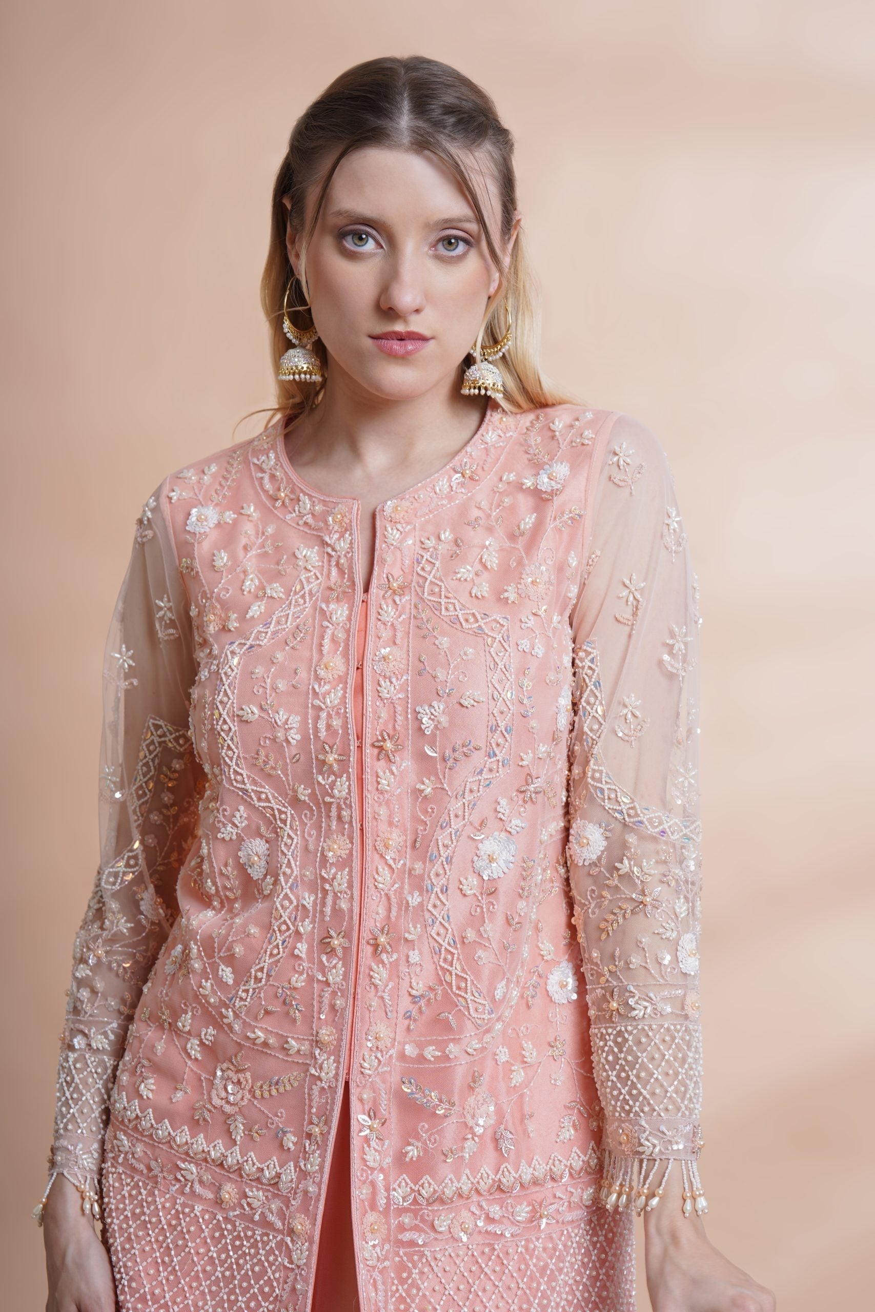 Image of Peach net kurta sharara set