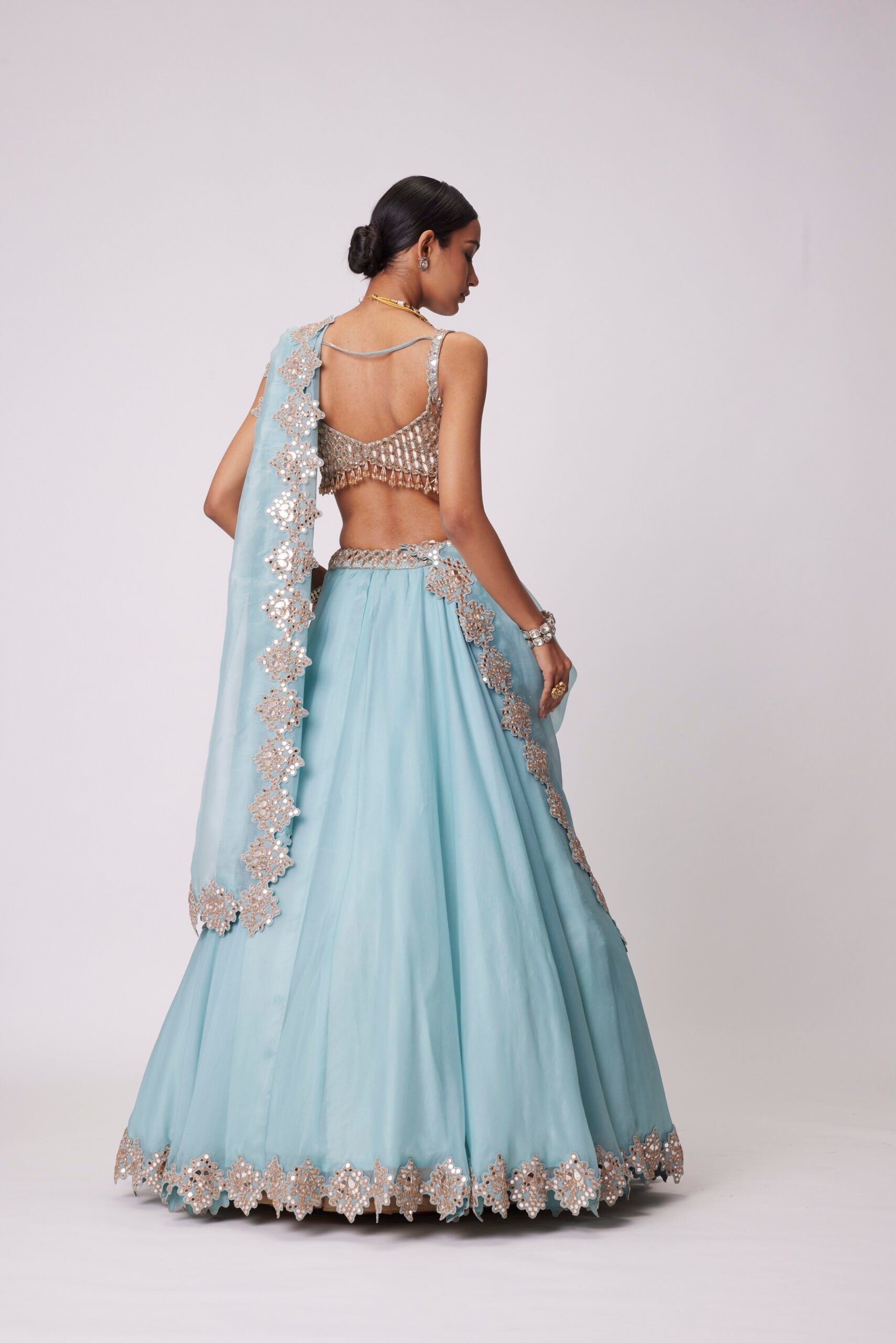 Image of POWDER BLUE ORGANZA HAND EMBROIDERED LEHENGA SET