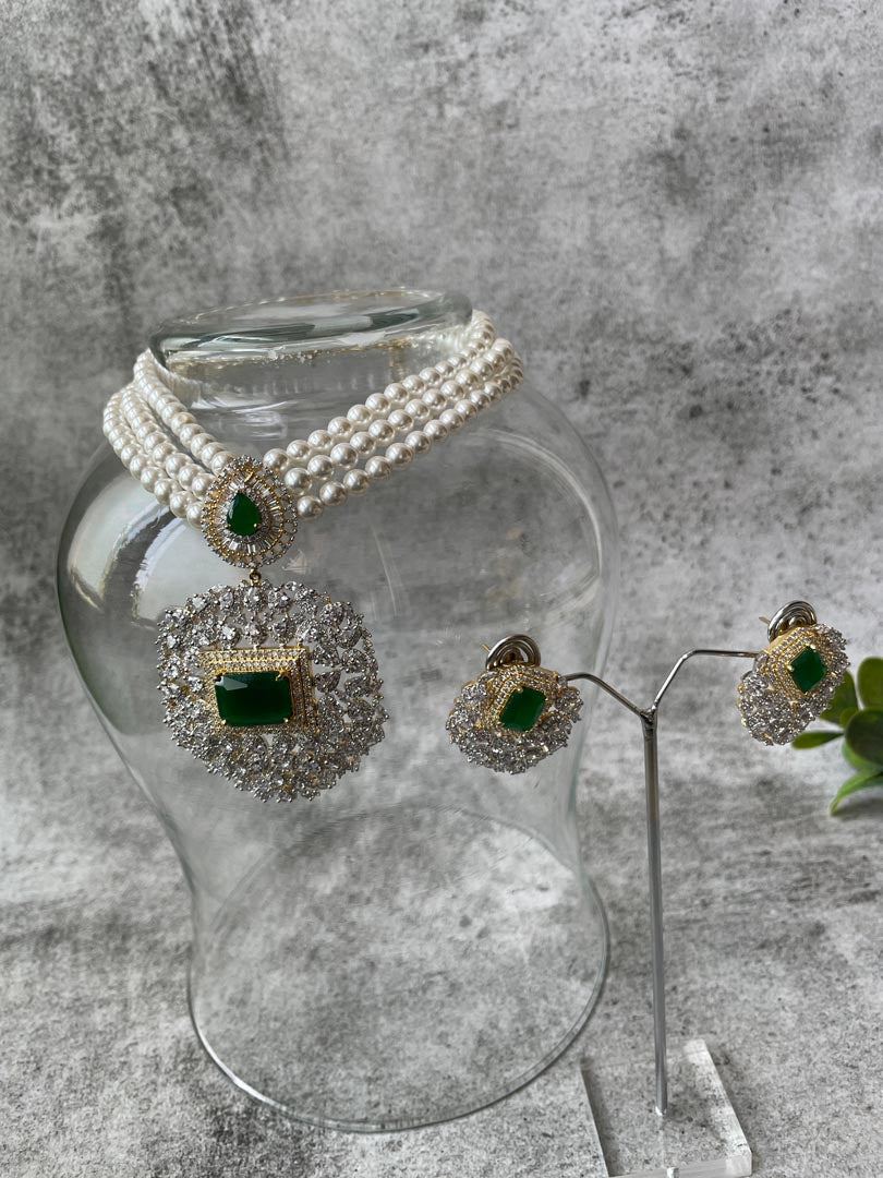 Gold Finish Pearl Strand Necklace with Zircon Motif and Green Center Stone