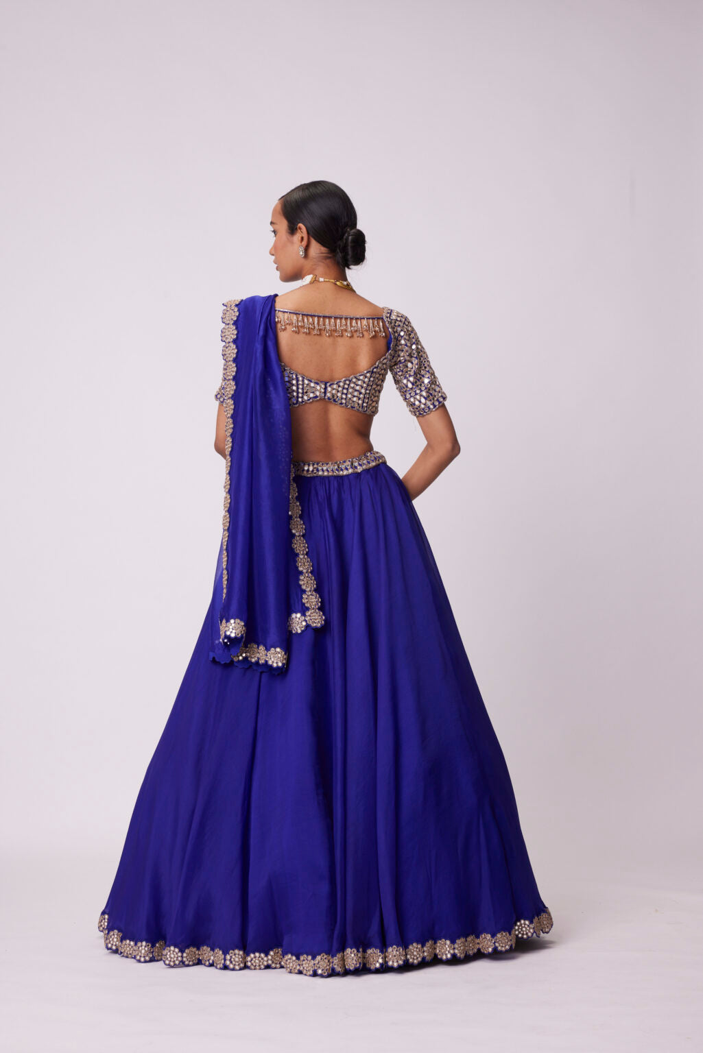 Image of PERSIAN BLUE ORGANZA HAND EMBROIDERED LEHENGA SET