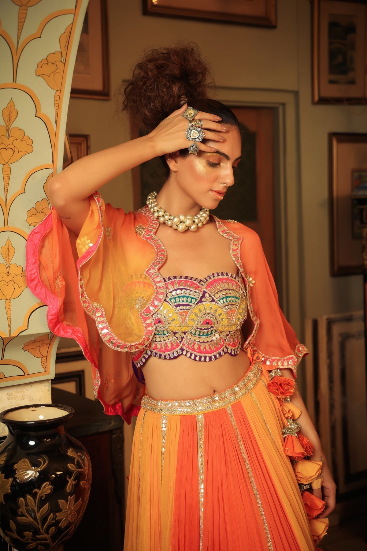 Image of Dilruba bejewelled gotapatti bandeau blouse and sunset ombre lehenga and scalloped shrug set