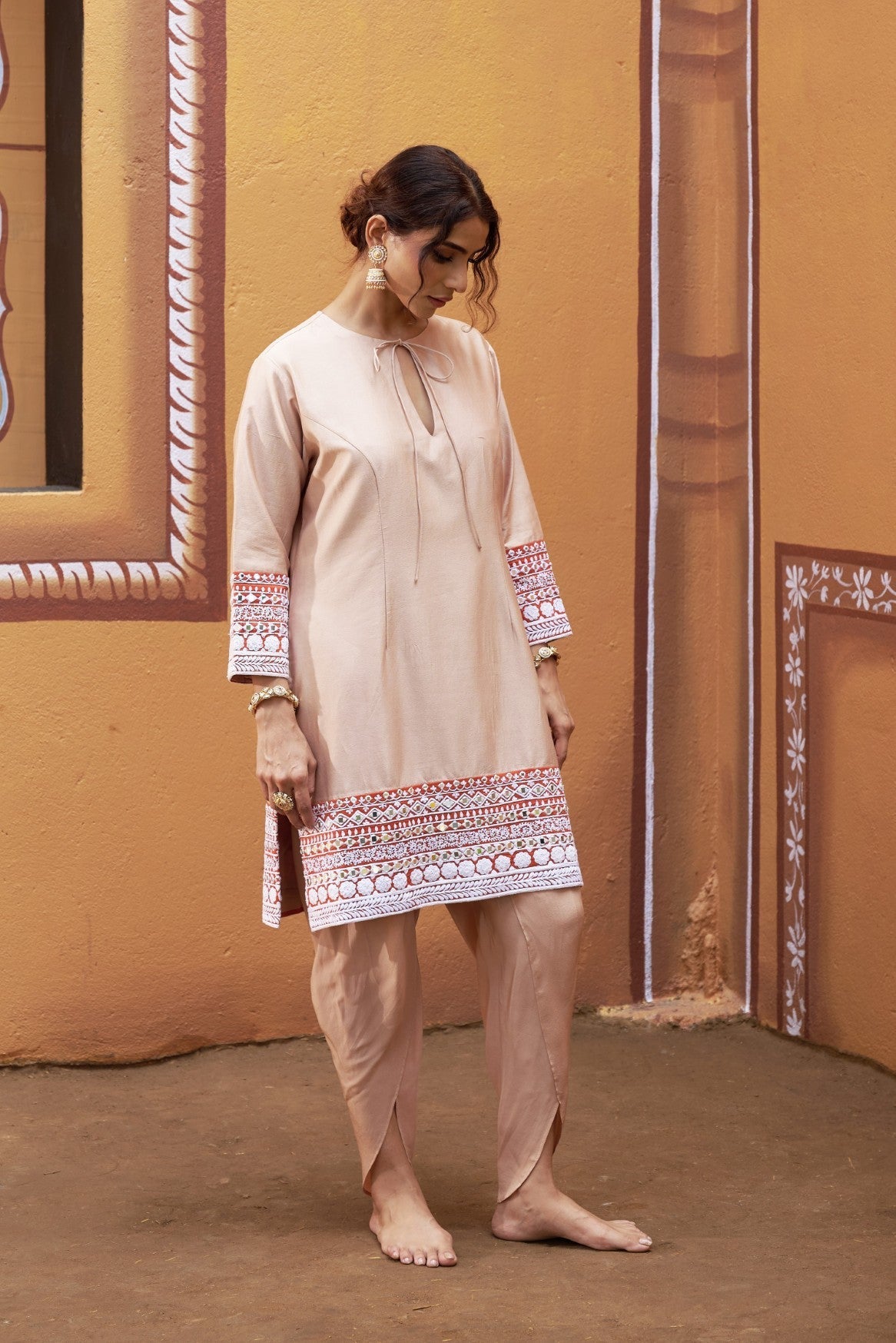 half and half beige kurta with tulip pants