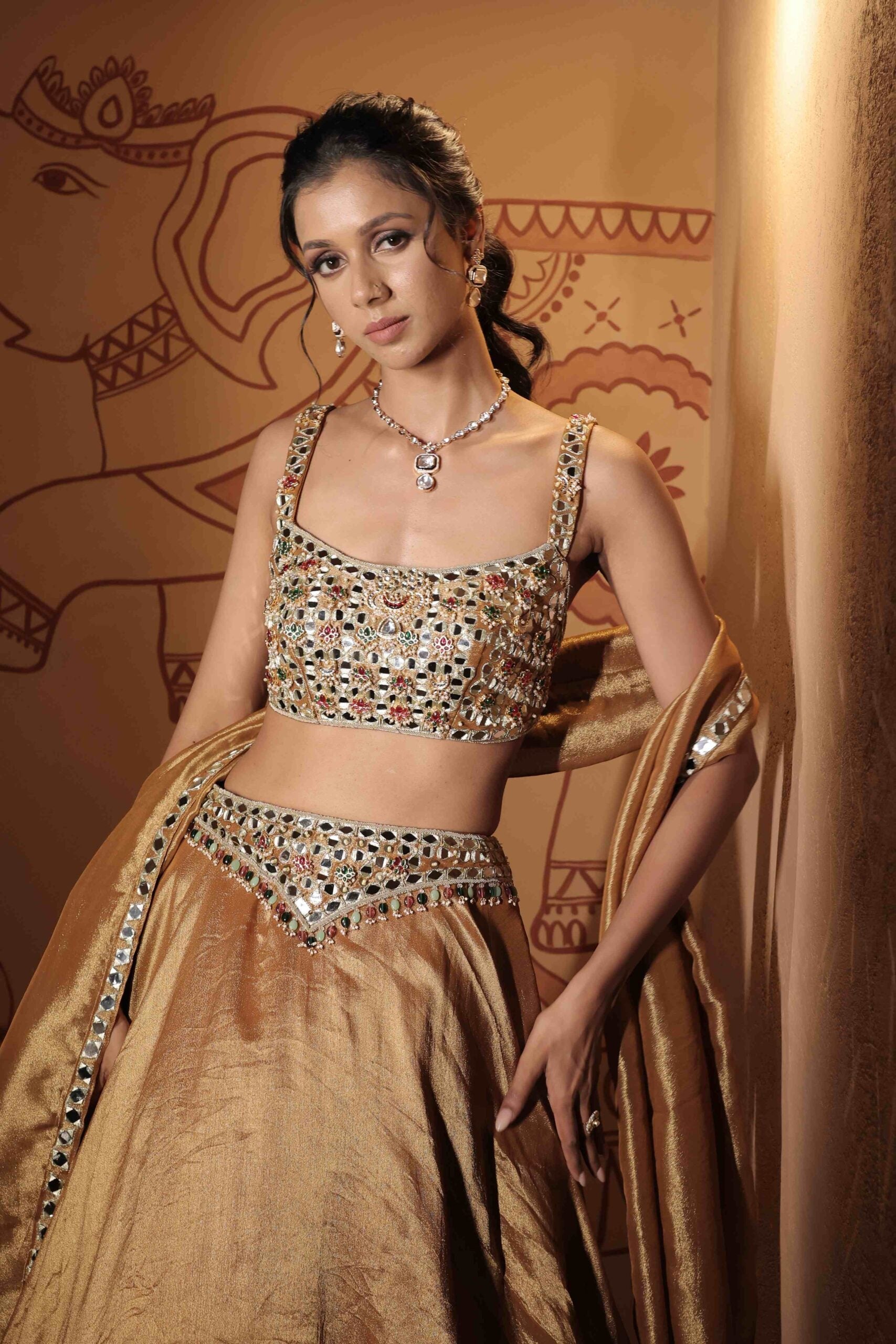 The "Kamalratna " lehenga set / Antique gold jewel and mirror embellished tissue lehenga set