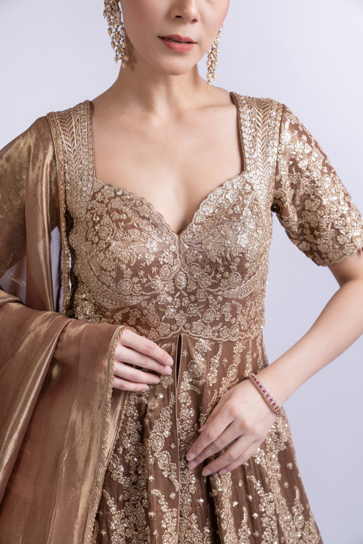 Regal Gold Embroidered Lehenga Set with Cape & Dupatta