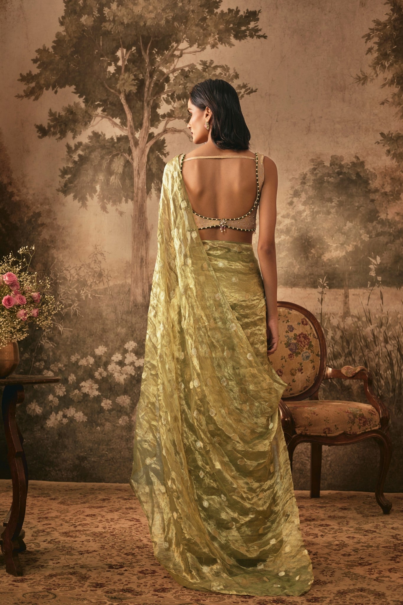 METALIC OLIVE TISSUE SILK PRE-DRAPED SAREE WITH EMBELLISHED BLOUSE