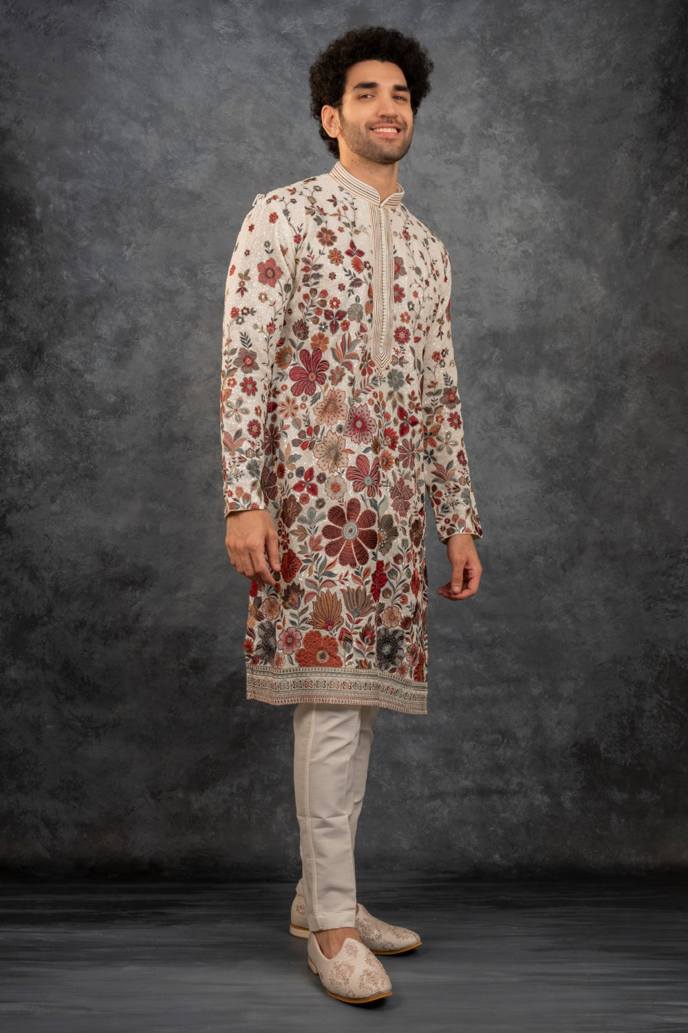 Beige silk kurta set with multicolour resham embroidery and sequins work