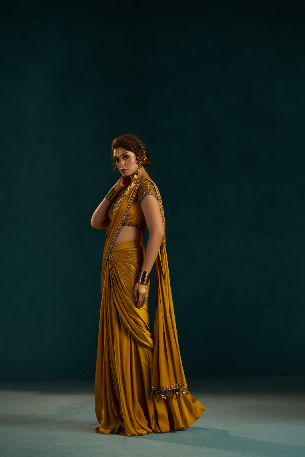 Mustard Yellow Modal Satin Drape Saree with Hand-Embellished Blouse.