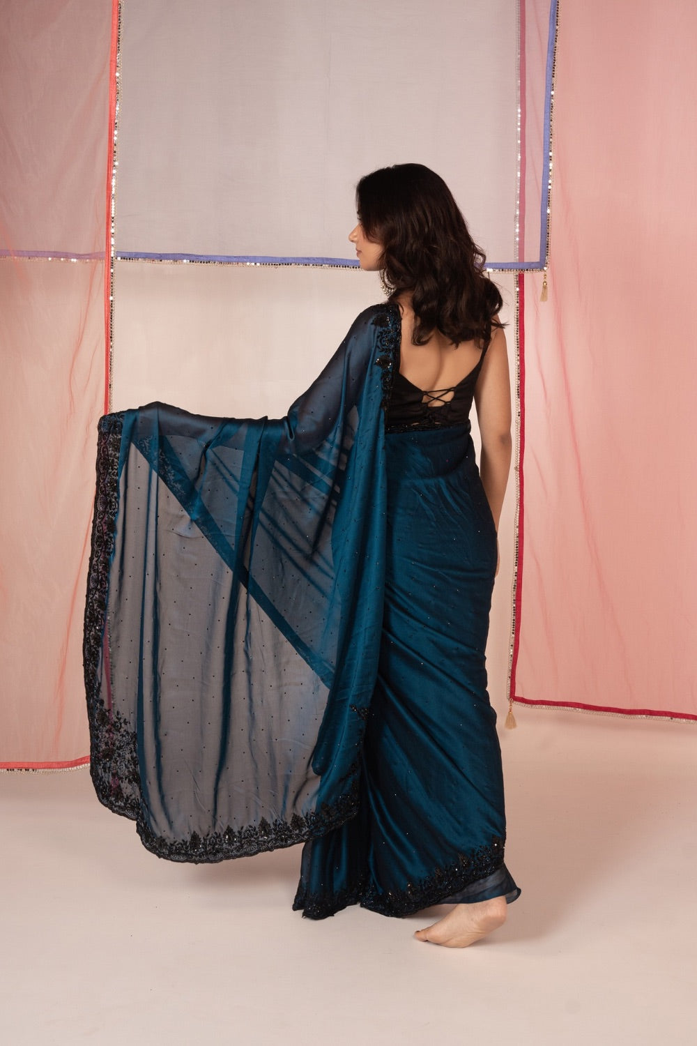 Peacock blue satin silk saree and unstitched blouse piece