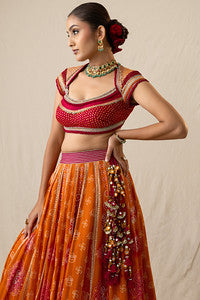 Radiant orange and red printed bandhej lehenga set