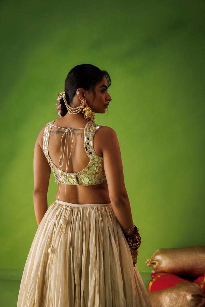 Beige crushed tissue lehenga with scallop dupatta