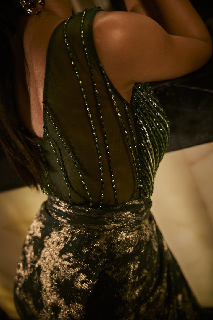Emerald green embellished gown.