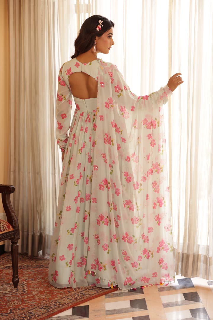 Image of Floral printed chiffon Anarkali with Embroidery and keyhole details on yoke. Paired with chiffon printed dupatta, beads and fringe latkan details all over the dupatta