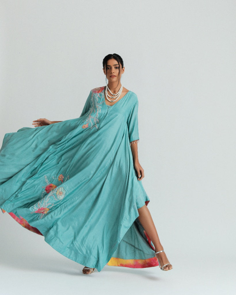 Silk mul mul tunic dress, with intricate floral patchwork, ombré organza motifs, and pockets. 