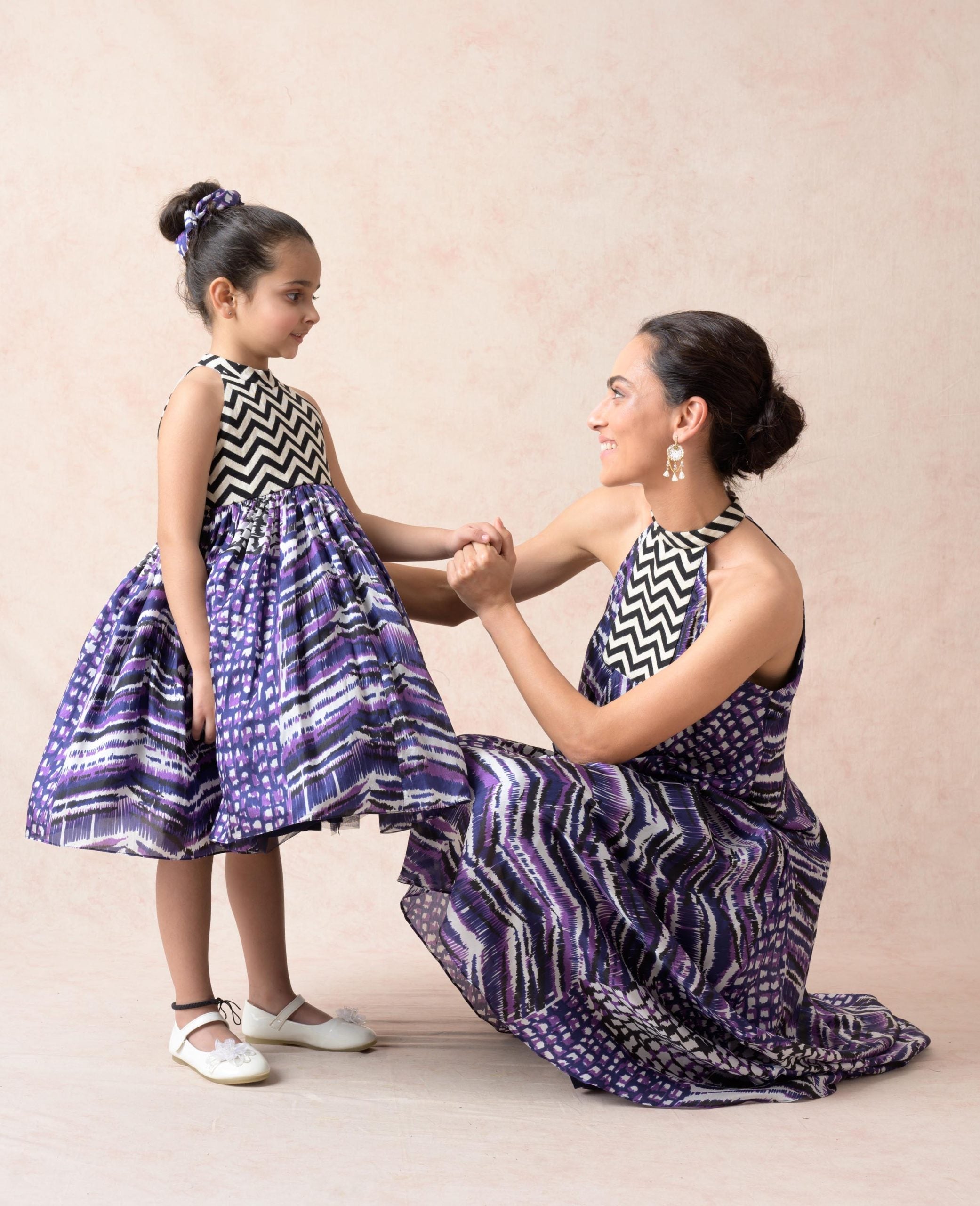 Abstract shades of purple with chevron weave halter neck bias dress with asymmetrical hemline