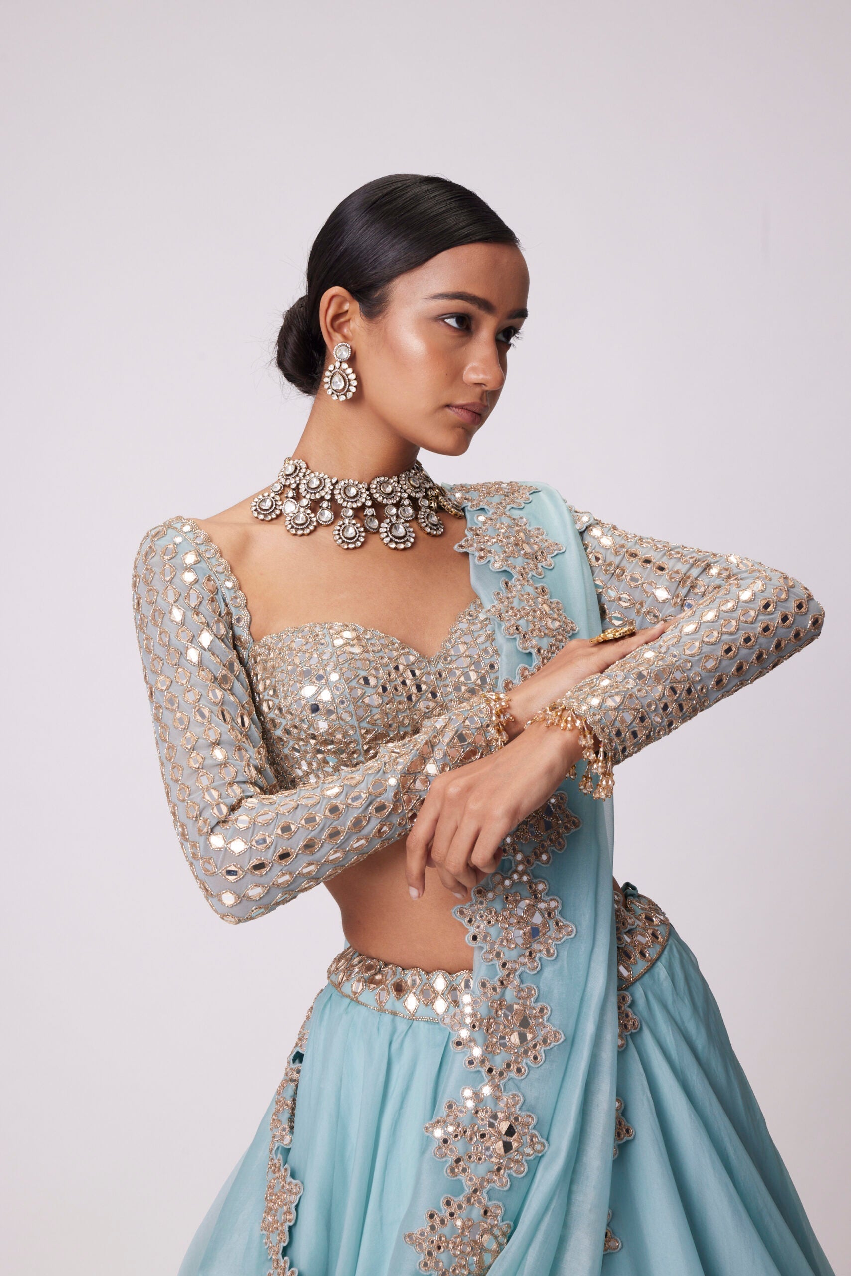 Image of POWDER BLUE ORGANZA MIRROR EMBROIDERED LEHENGA SET