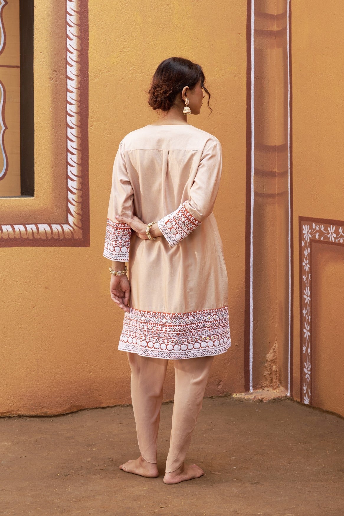 half and half beige kurta with tulip pants