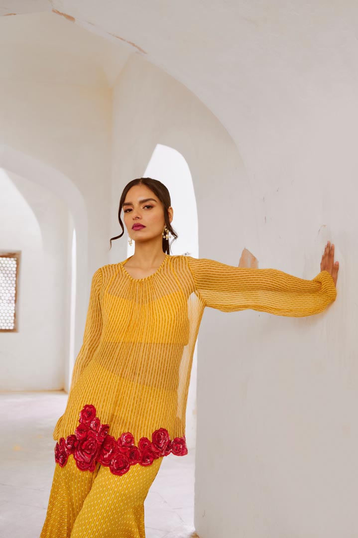 Image of Gulbahar Marigold Yellow Gulaab tunic set with  Bell Bottoms and inner