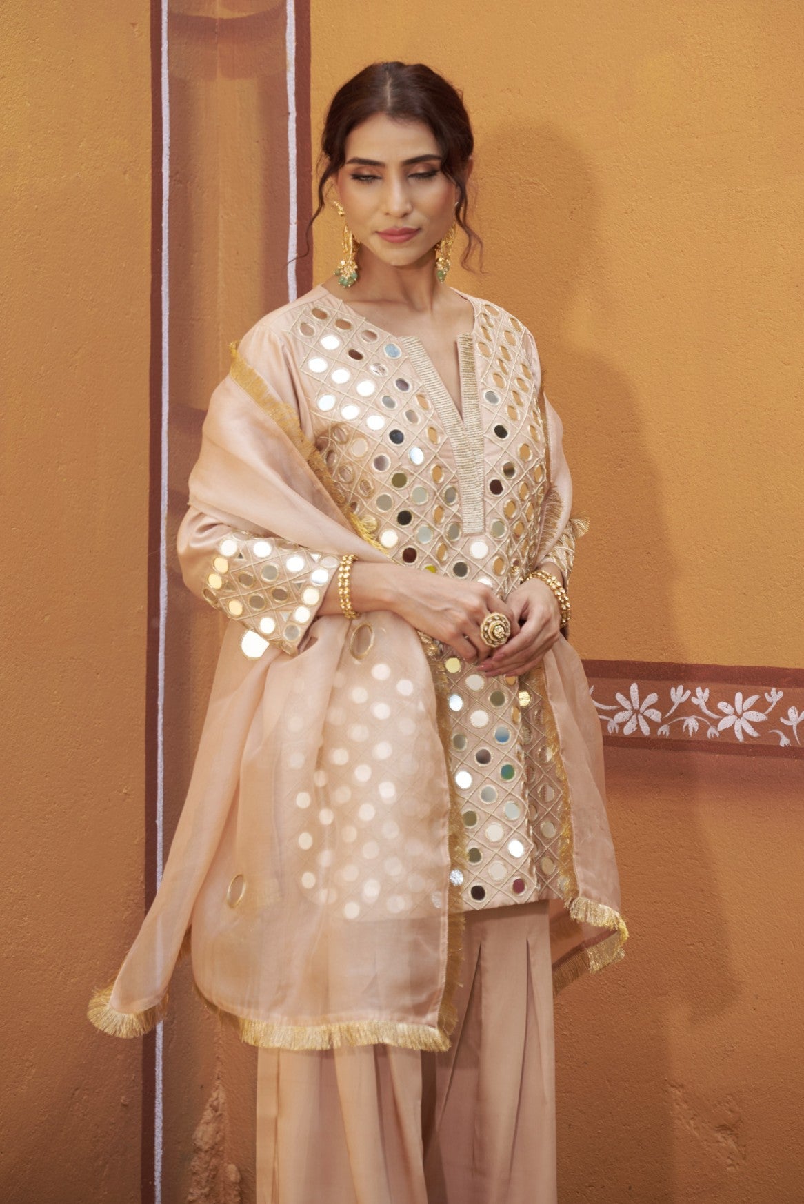 Fully hand embroidered short cris cross kurta with pleated pants