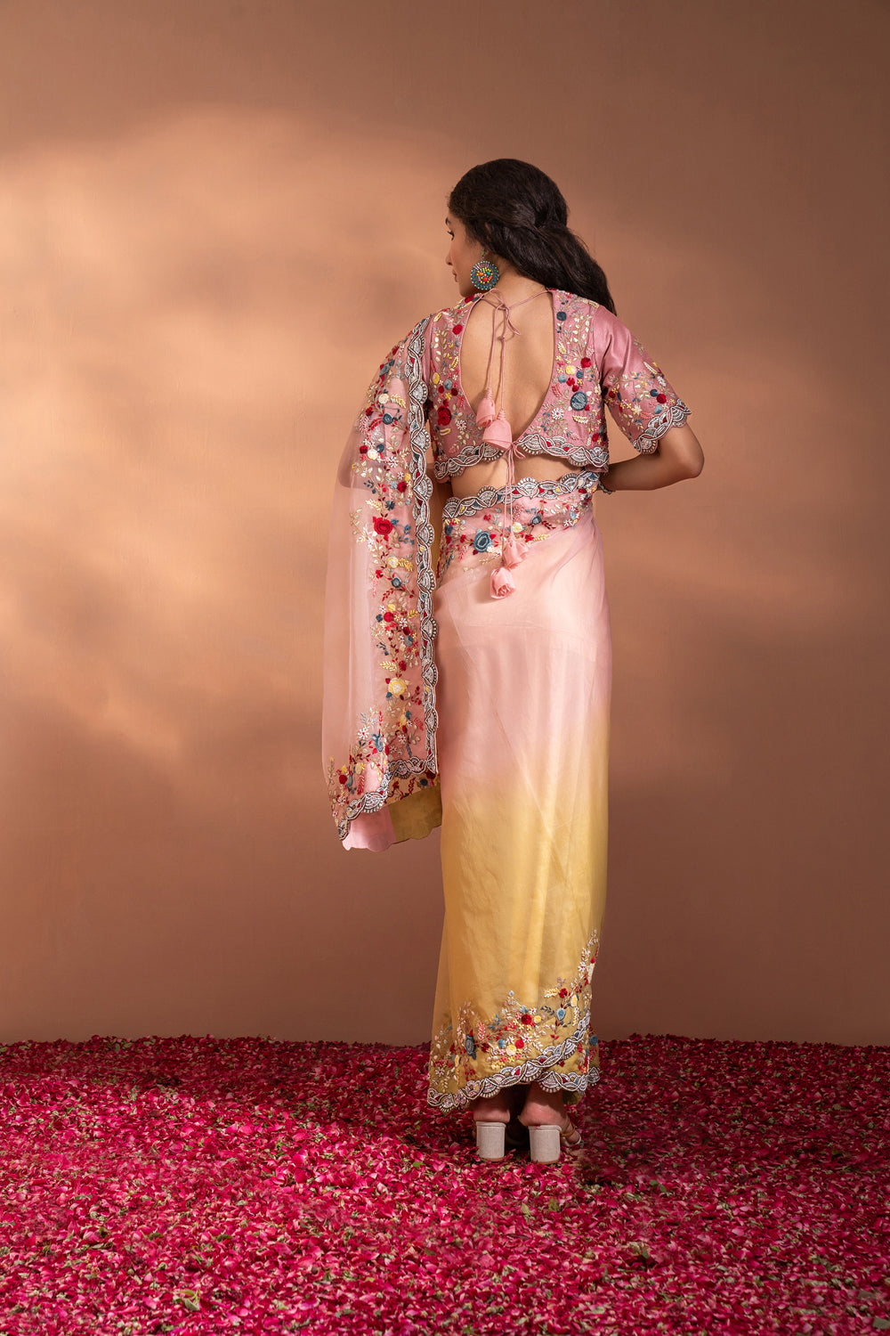 The Saree In Organza With Sequins, Moti & Threadwork In A Pastel Gradience Shade.