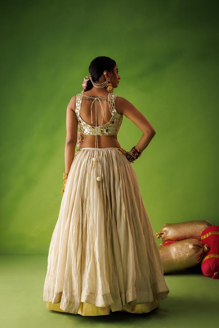 Beige crushed tissue lehenga with scallop dupatta