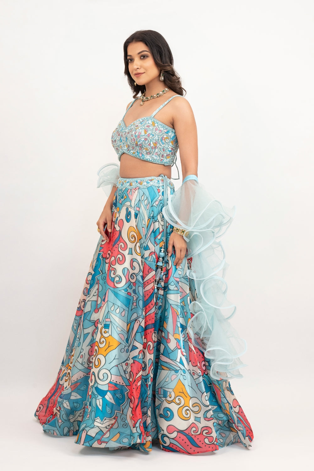 Blue organza lehenga choli with sequins work, hand cut dana work and pearls