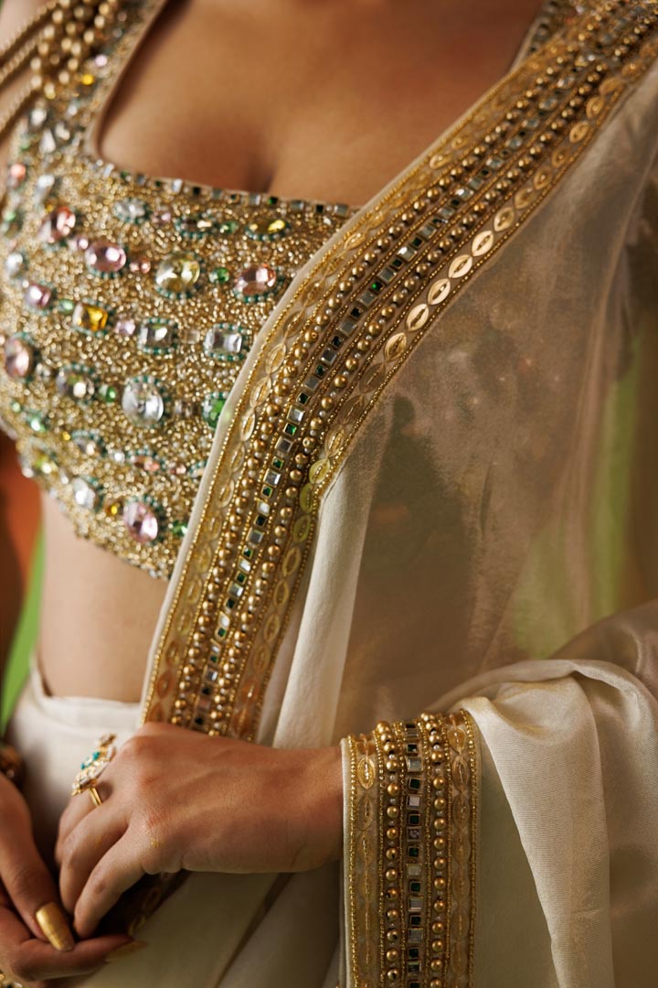 Beige tissue stone embellished saree set