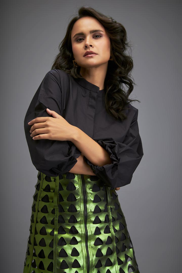 Shirt Paired With A Metallic Mini Skirt