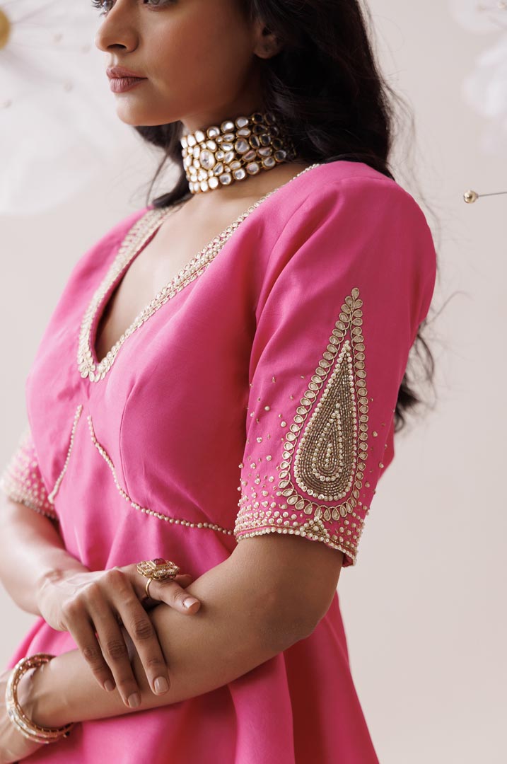 Pink peplum blouse and skirt set