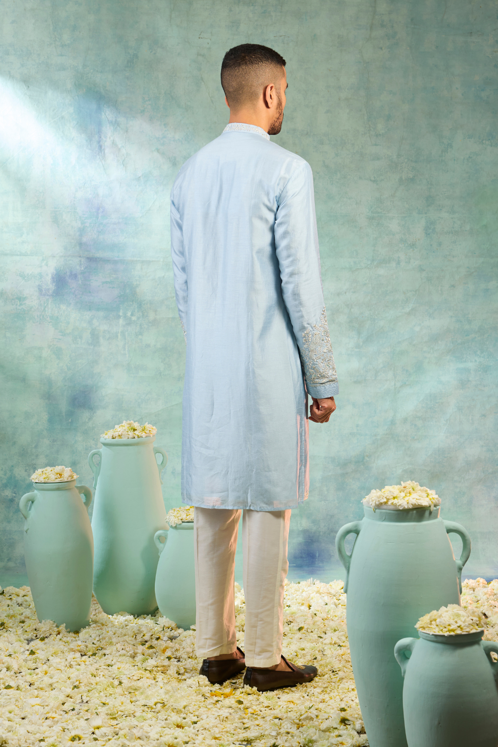 Baby blue silk kurta and pearl white koti with mirror embroidery and thread work