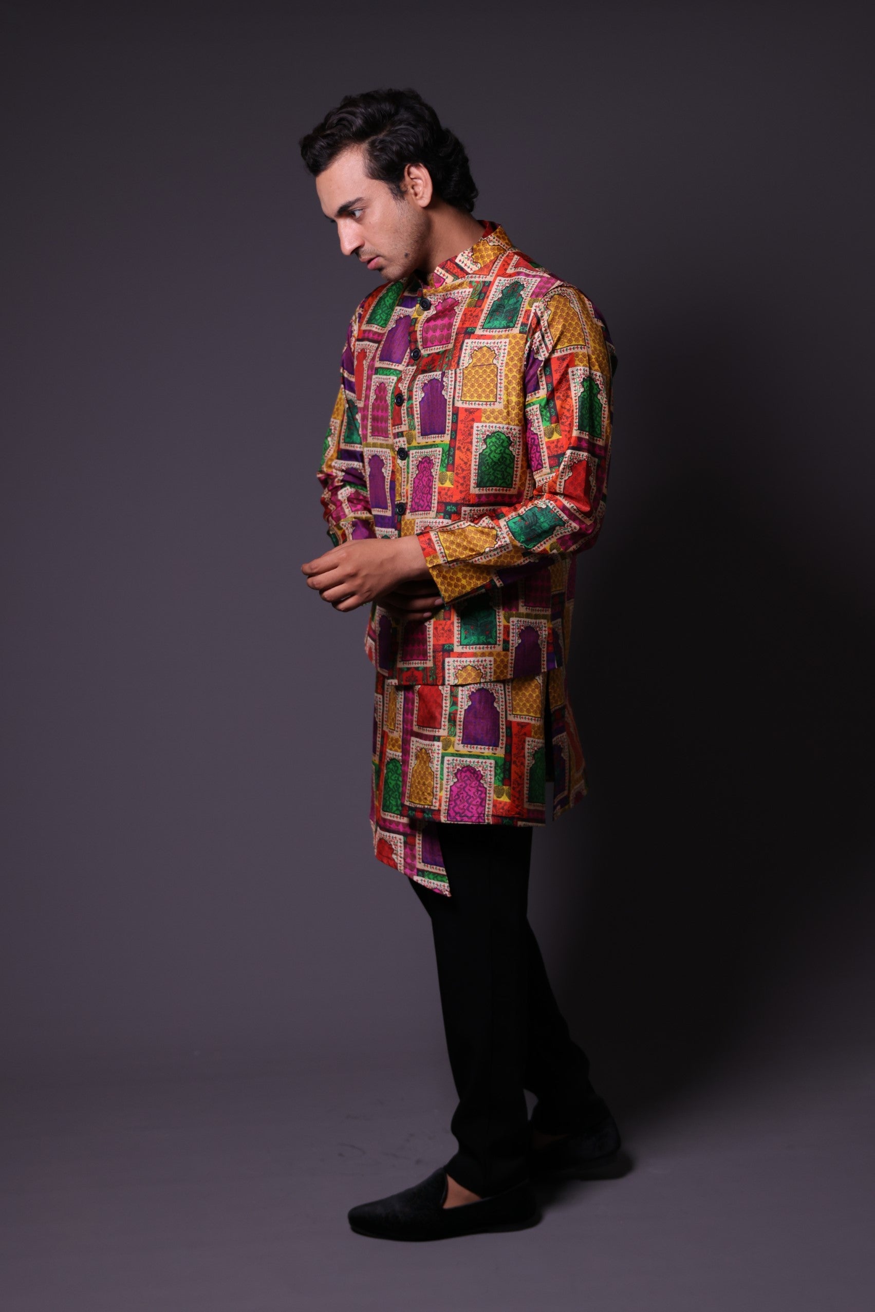 Nehru Jacket with asymmetrical
 kurta and pant