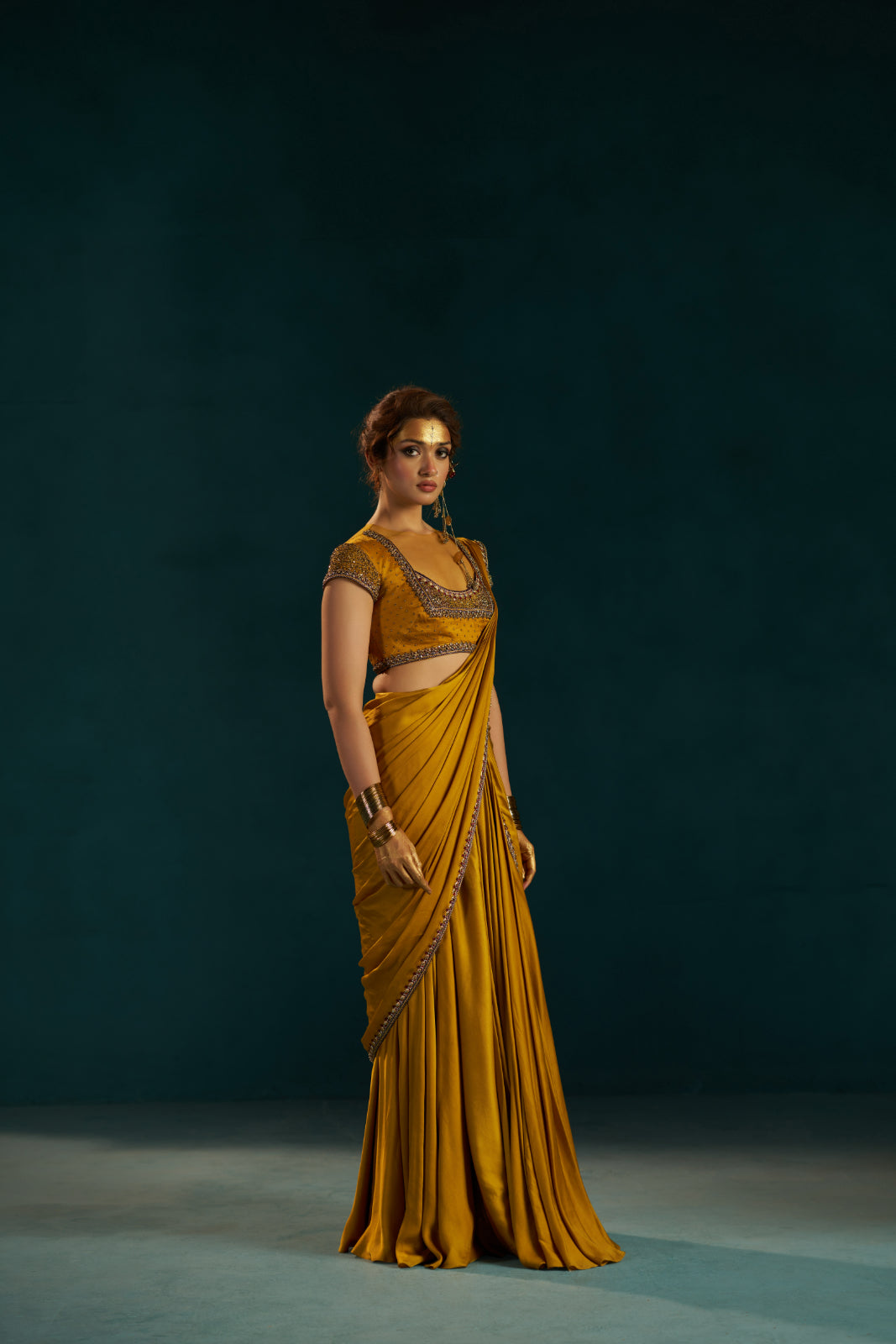 Mustard Yellow Modal Satin Drape Saree with Hand-Embellished Blouse.