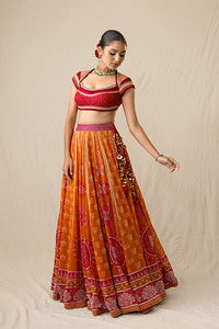 Radiant orange and red printed bandhej lehenga set