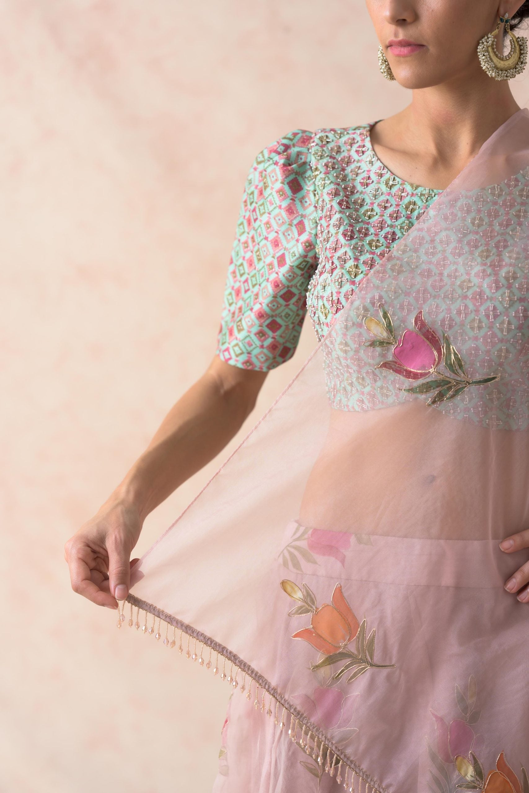 Hand embroidered blouse with powder pink organza lehenga with hand painted buttis, dupatta