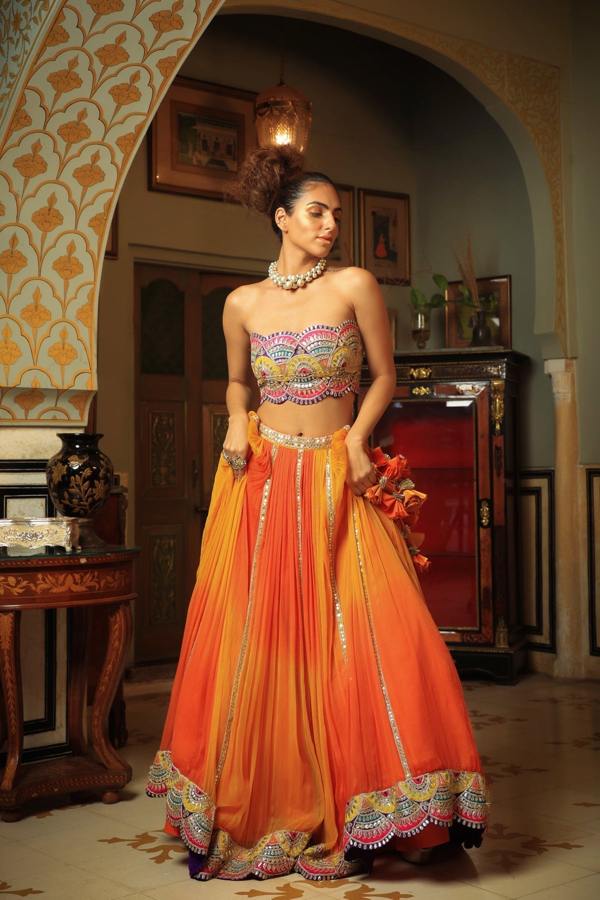 Image of Dilruba bejewelled gotapatti bandeau blouse and sunset ombre lehenga and scalloped shrug set