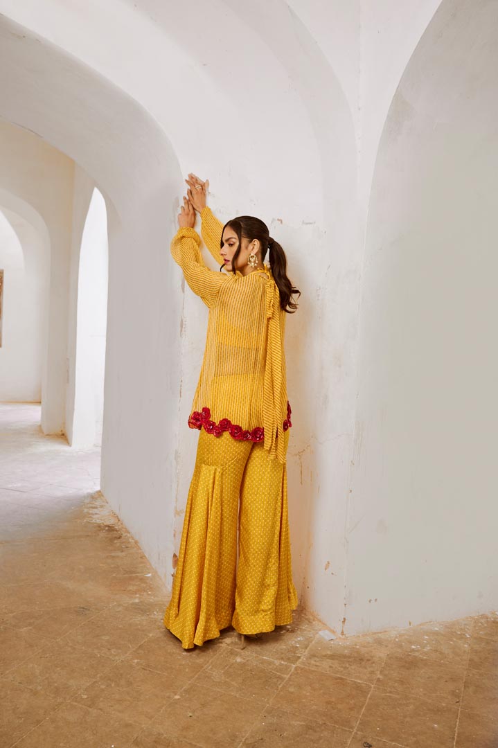 Image of Gulbahar Marigold Yellow Gulaab tunic set with  Bell Bottoms and inner