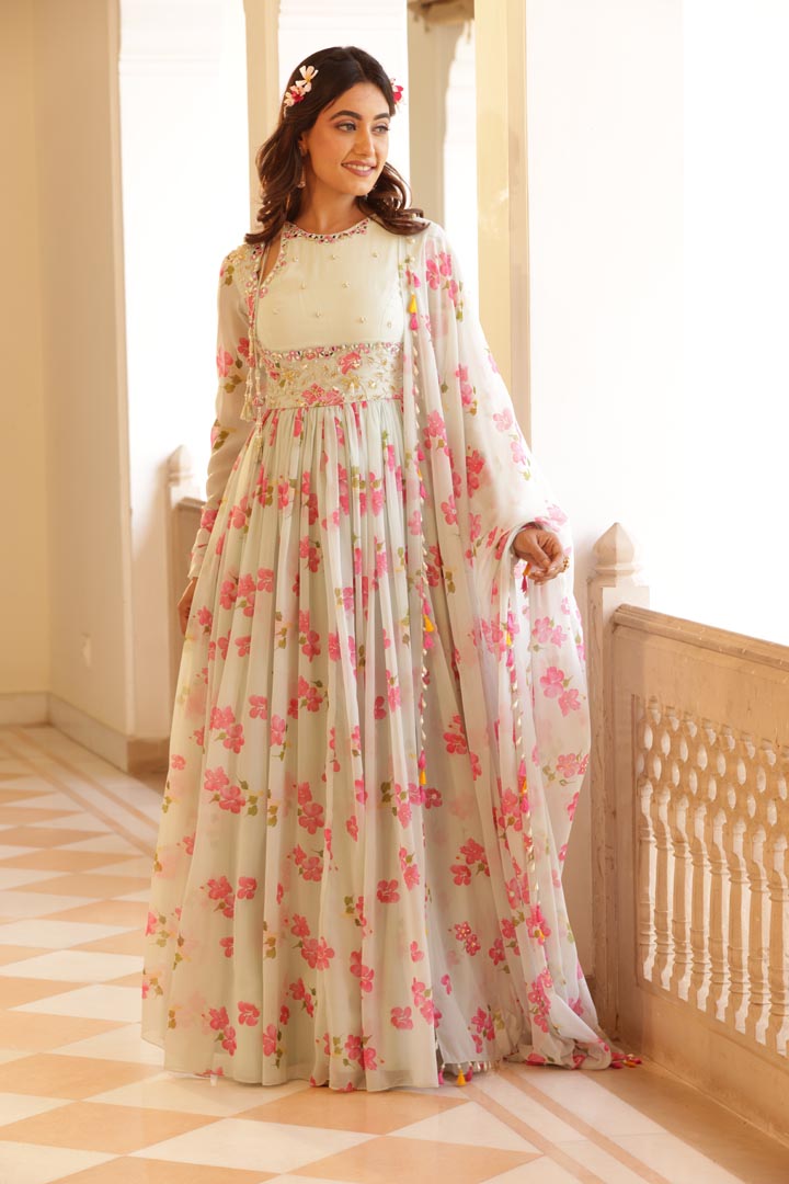 Image of Floral printed chiffon Anarkali with Embroidery and keyhole details on yoke. Paired with chiffon printed dupatta, beads and fringe latkan details all over the dupatta