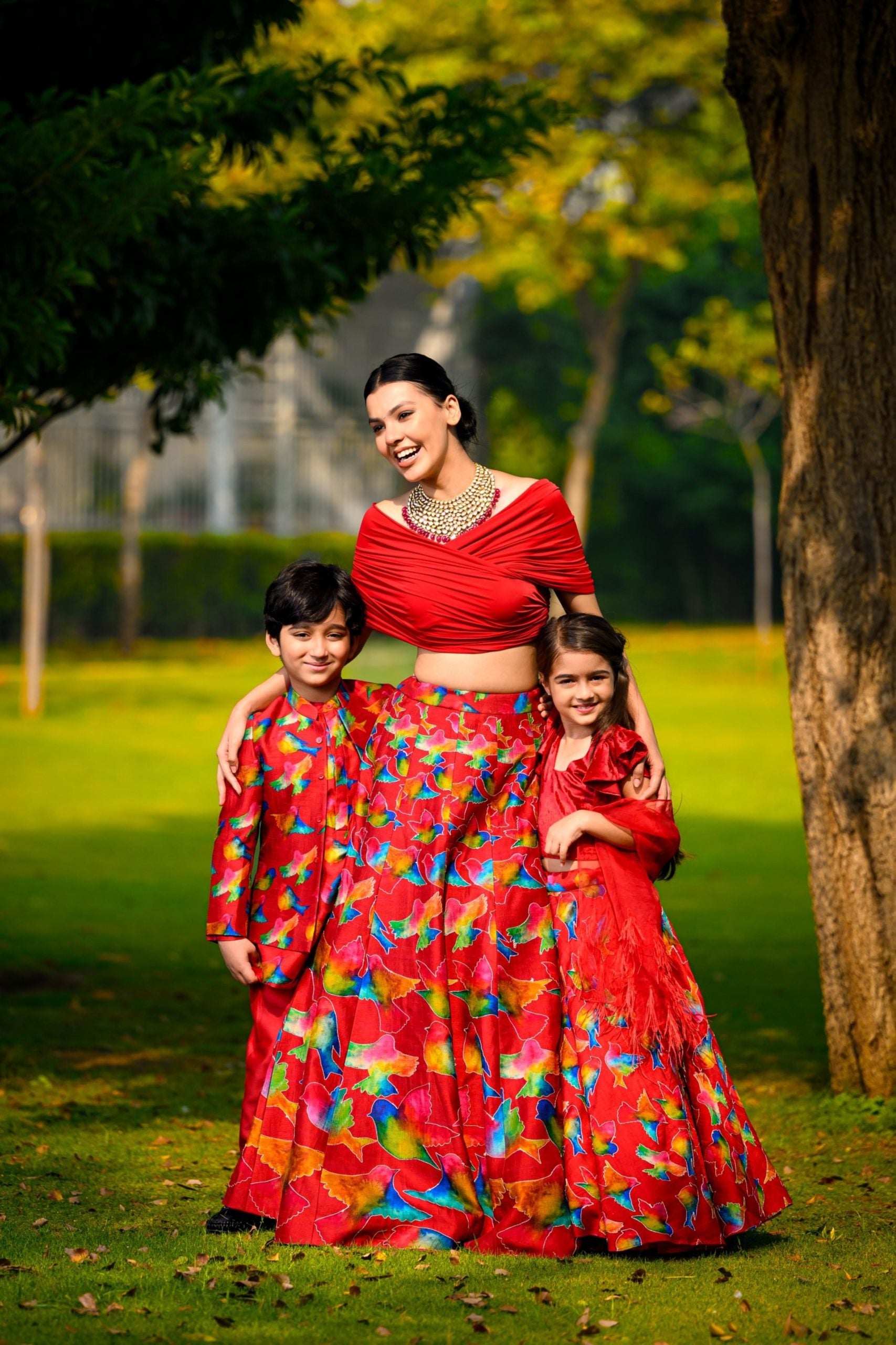 Hand embroidered lehenga with ruffle blouse and feather dupatta