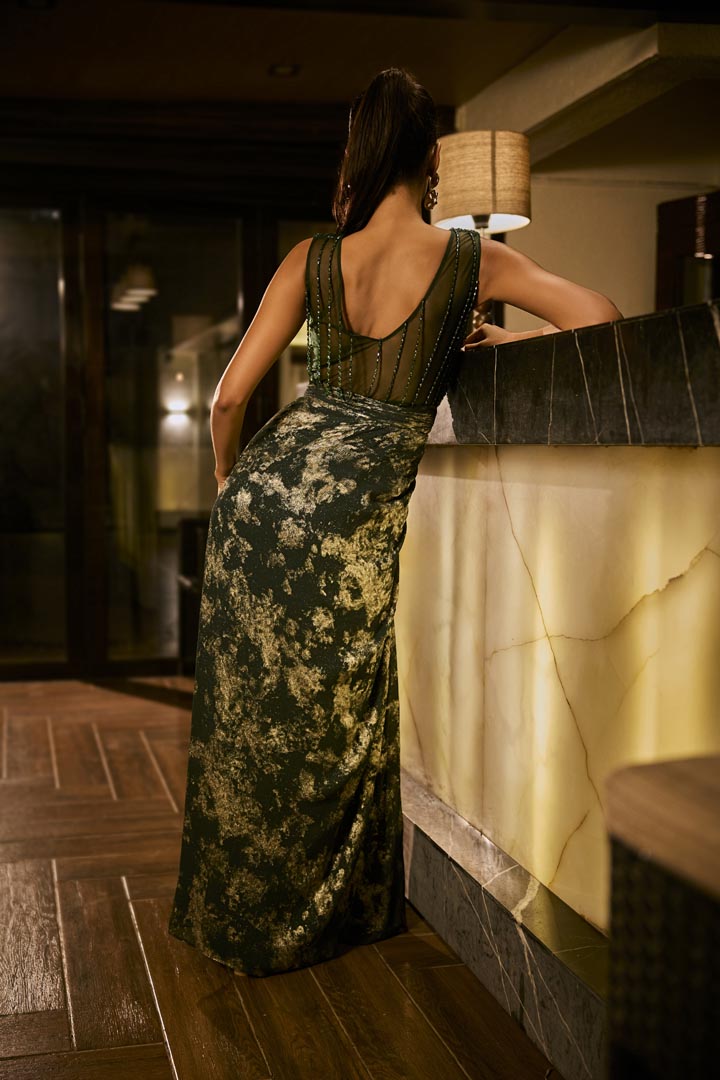 Emerald green embellished gown.