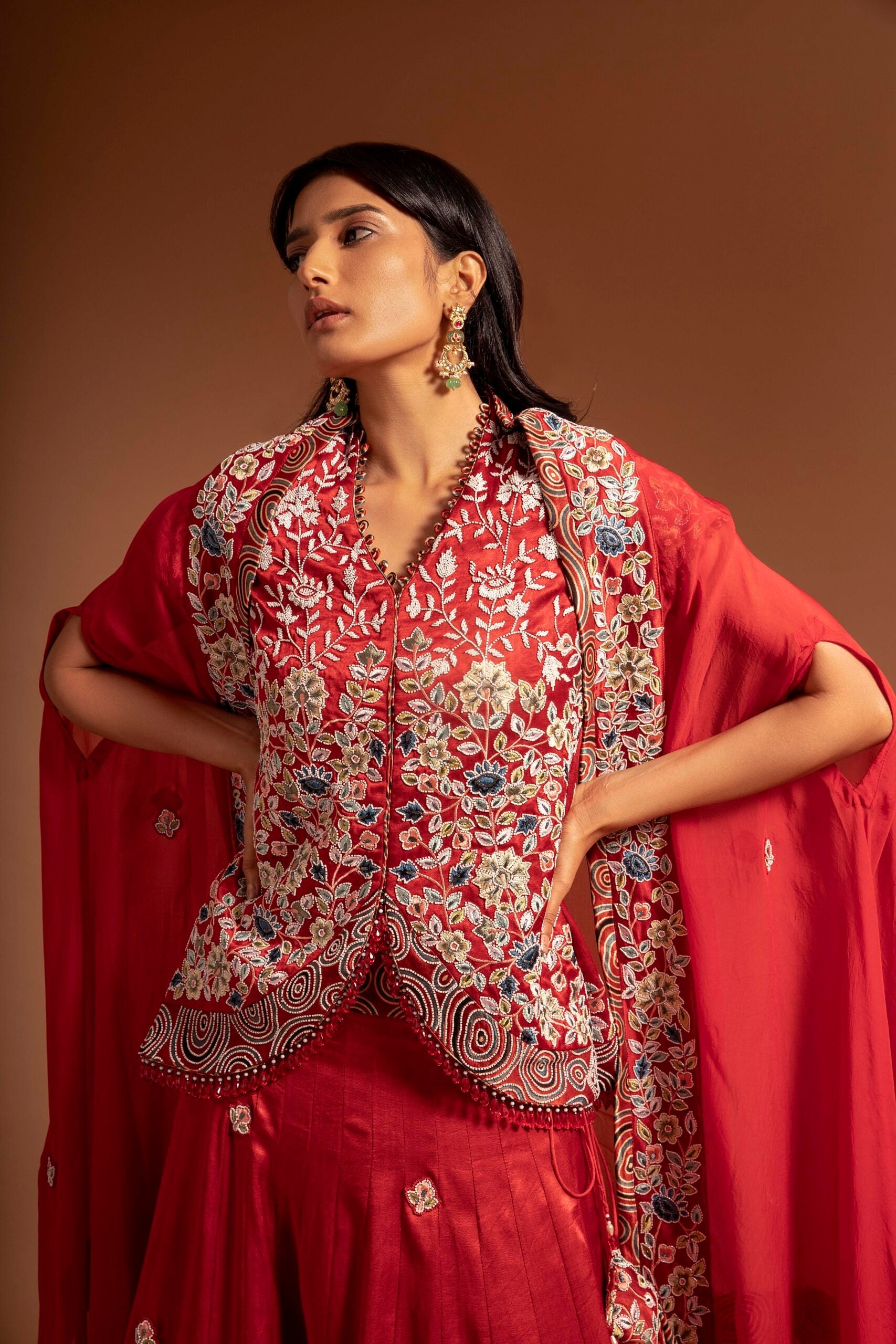 Red fully handcarfted jacket with lehenga and cape dupatta