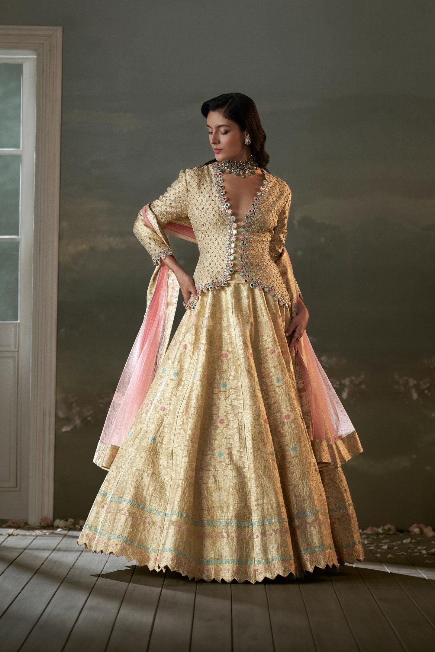 Gold Woven Banarasi Silk Lehenga with Jacket Blouse & Net Dupatta