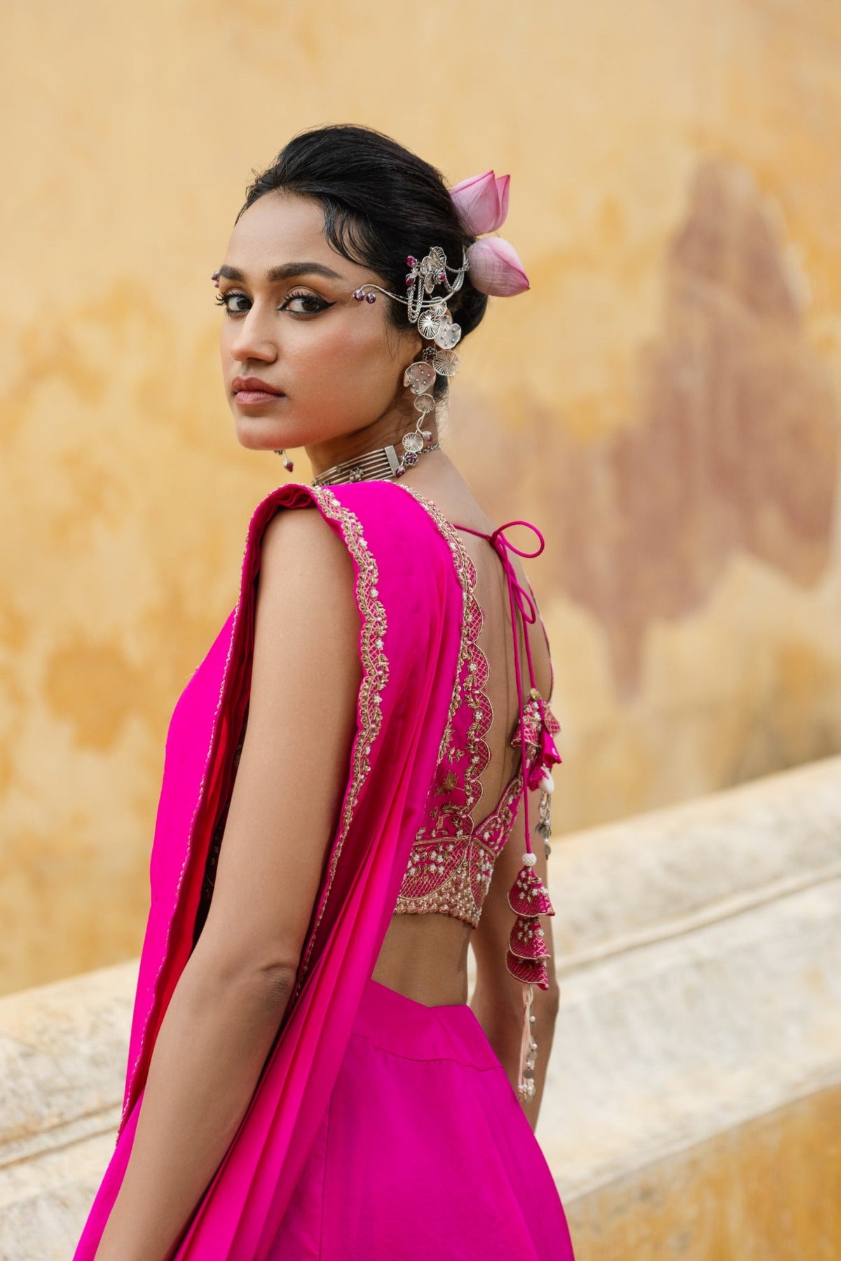 Bright fuschia draped saree
