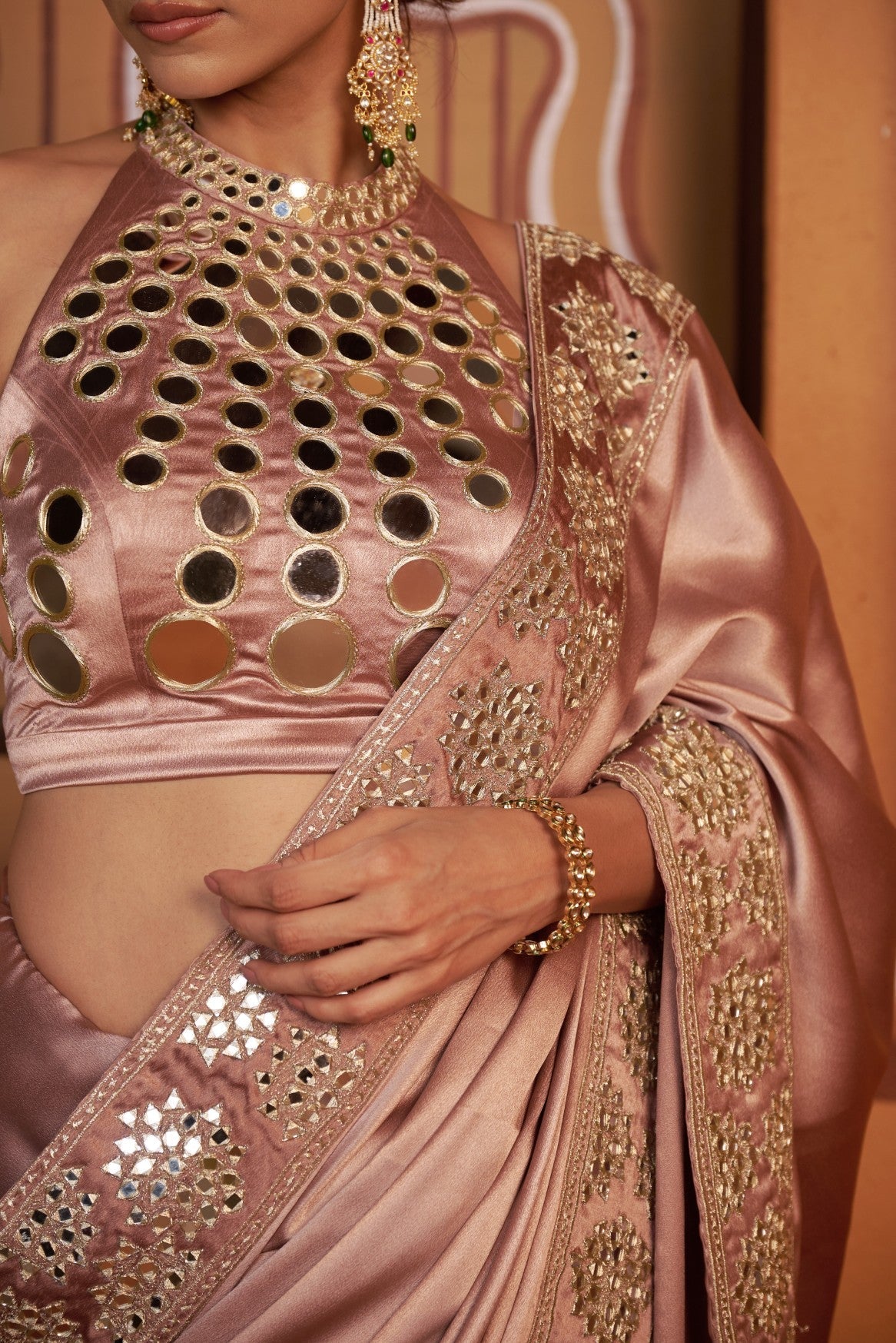 Sun ray hand embroidered blouse with mirror work border saree