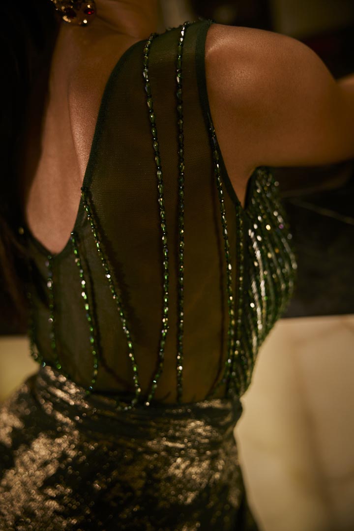 Emerald green embellished gown.