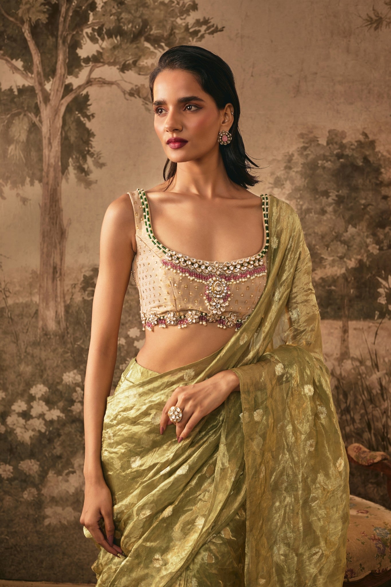 METALIC OLIVE TISSUE SILK PRE-DRAPED SAREE WITH EMBELLISHED BLOUSE